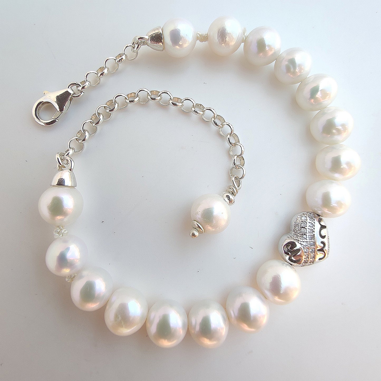 ST68 - Bracciale in argento con perle naturali d'acqua dolce e zirconi