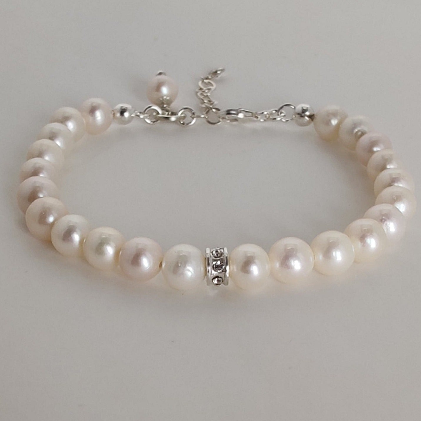 ST005 Pulsera de plata con perlas de agua dulce y circonitas