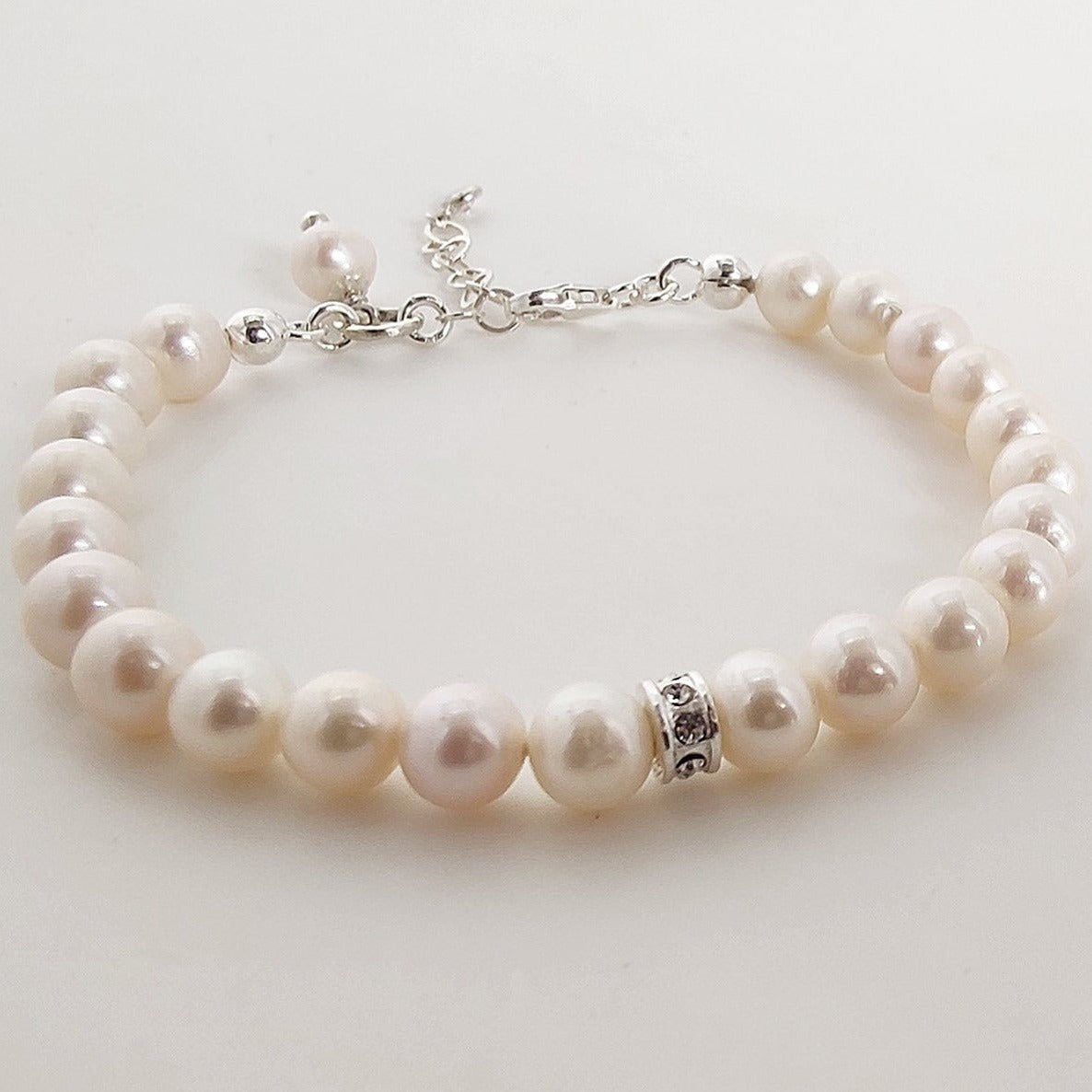 ST005 Pulsera de plata con perlas de agua dulce y circonitas