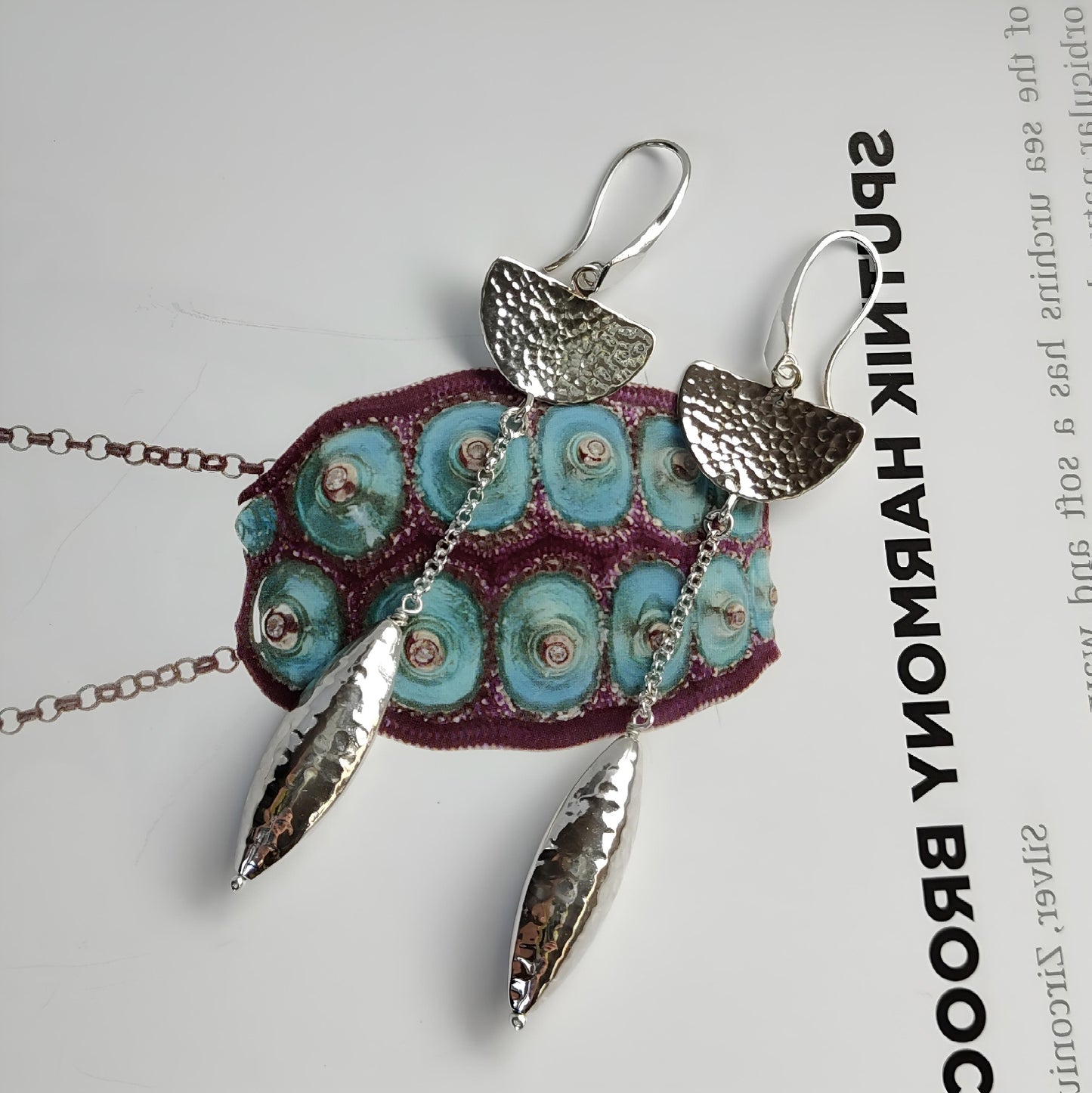 ST04 - Orecchini in Argento martellato 925