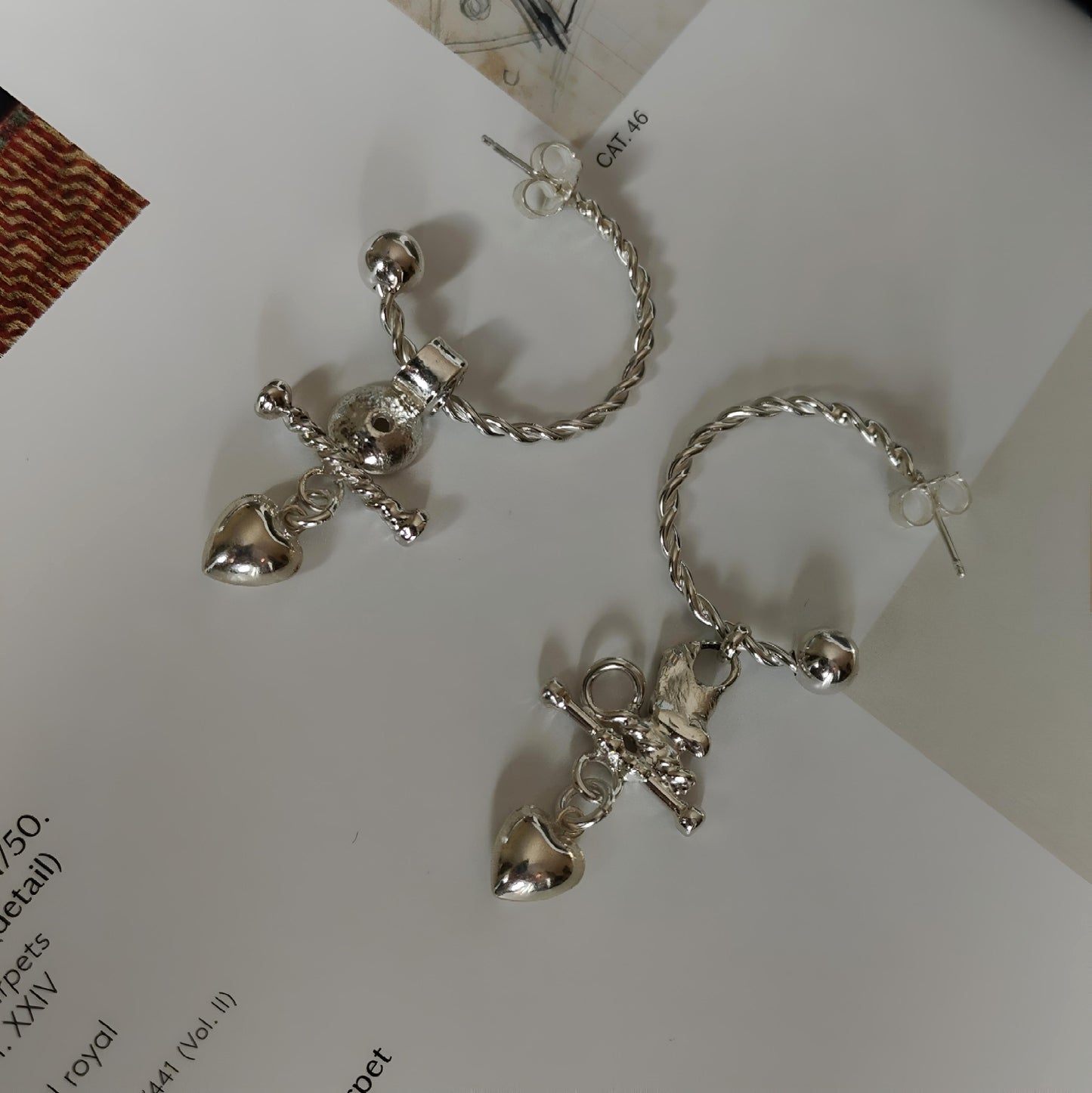 ST03 - Orecchini a cerchio in argento 925 – Cuore e intreccio