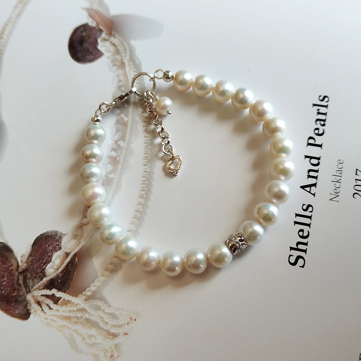 ST030 -  Bracciale Perle 7-8mm con Zirconi – Argento 925