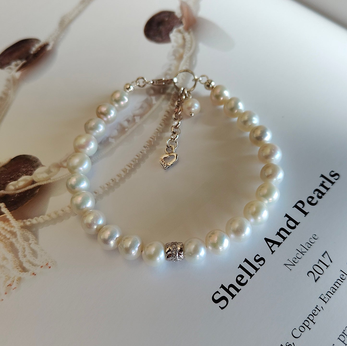 ST030 -  Bracciale Perle 7-8mm con Zirconi – Argento 925