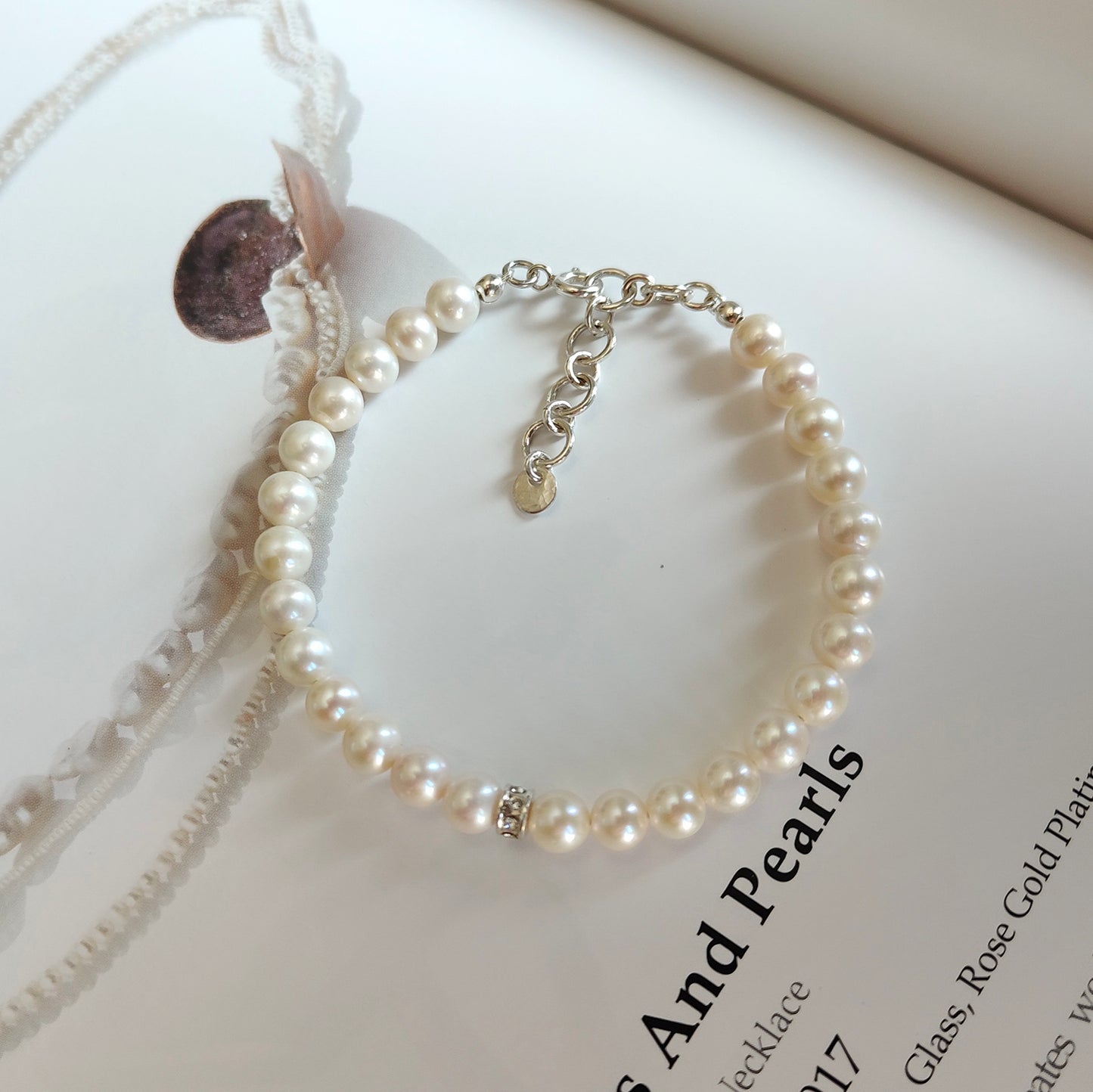 ST031 - Bracciale Perle 6-6,5mm con Dischetto – Argento 925