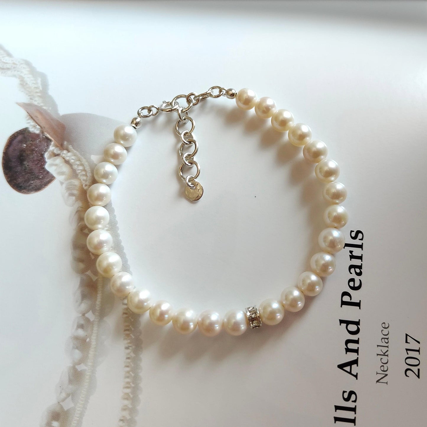 ST031 - Bracciale Perle 6-6,5mm con Dischetto – Argento 925
