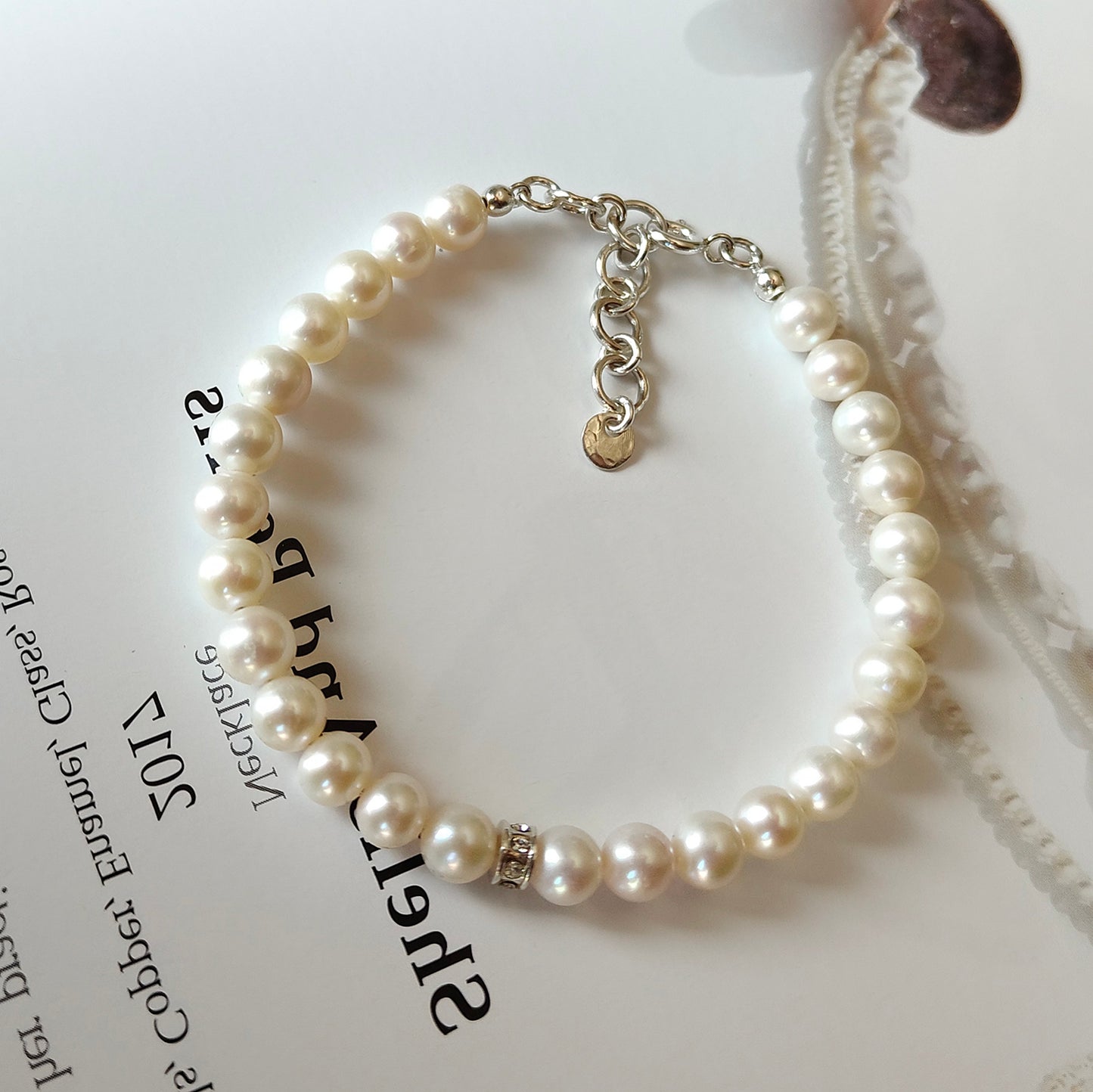 ST031 - Bracciale Perle 6-6,5mm con Dischetto – Argento 925